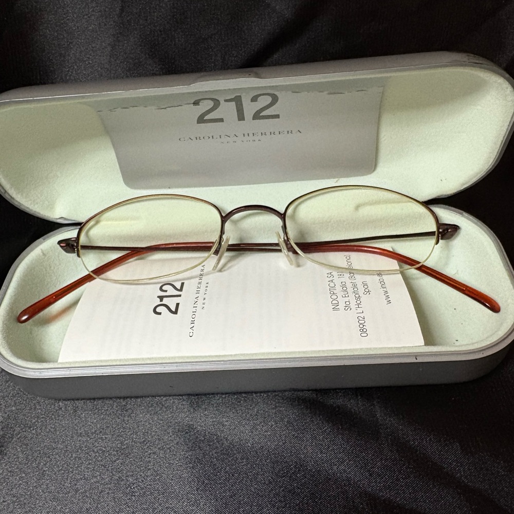 Carolina Herrera Silver and Brown Glasses Minimalist Design